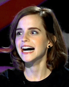 Emma-Watson-troll-face-forced-smile-mouth-open-smile-14086421456